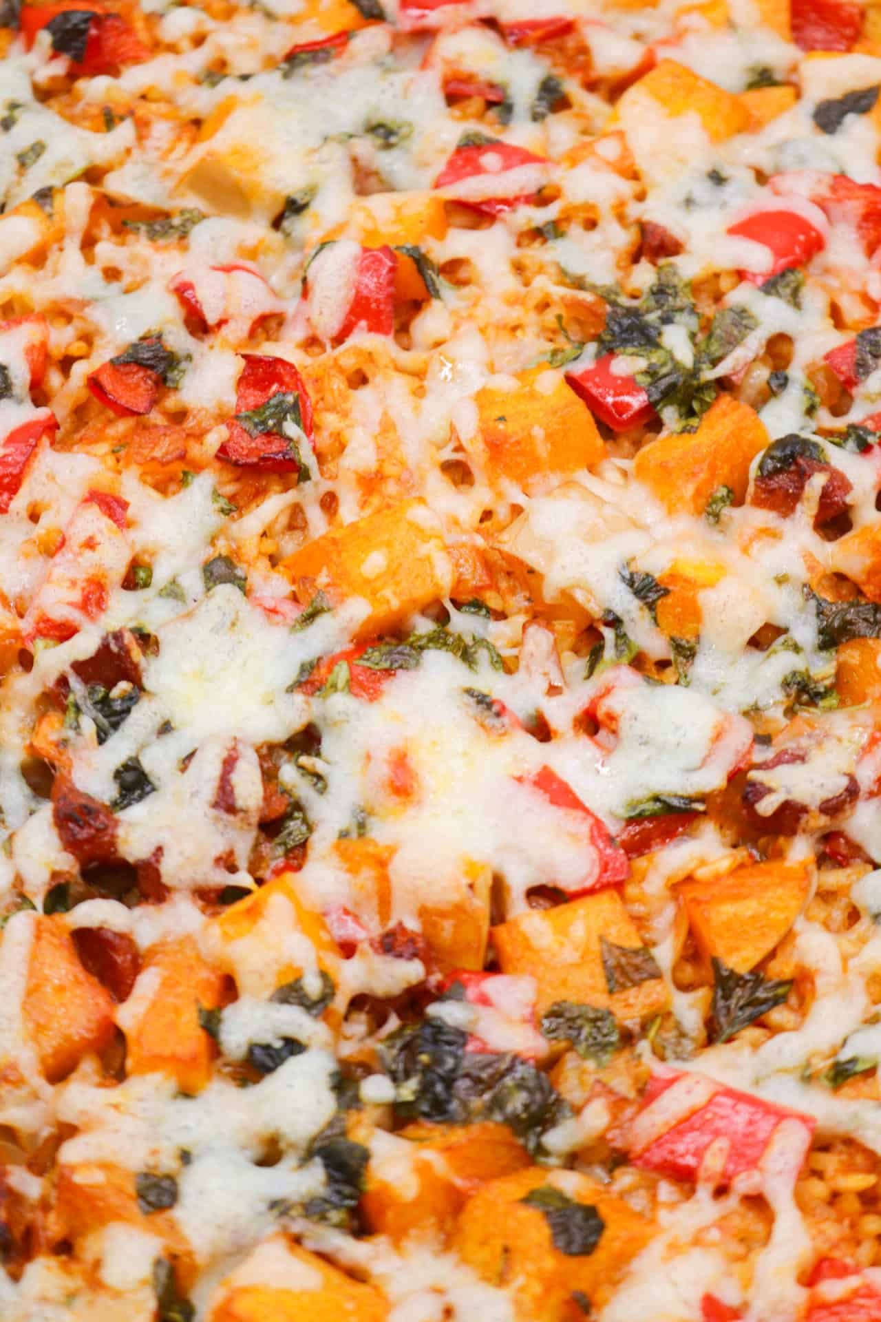 Chorizo squash rice with manchego in large round casserole