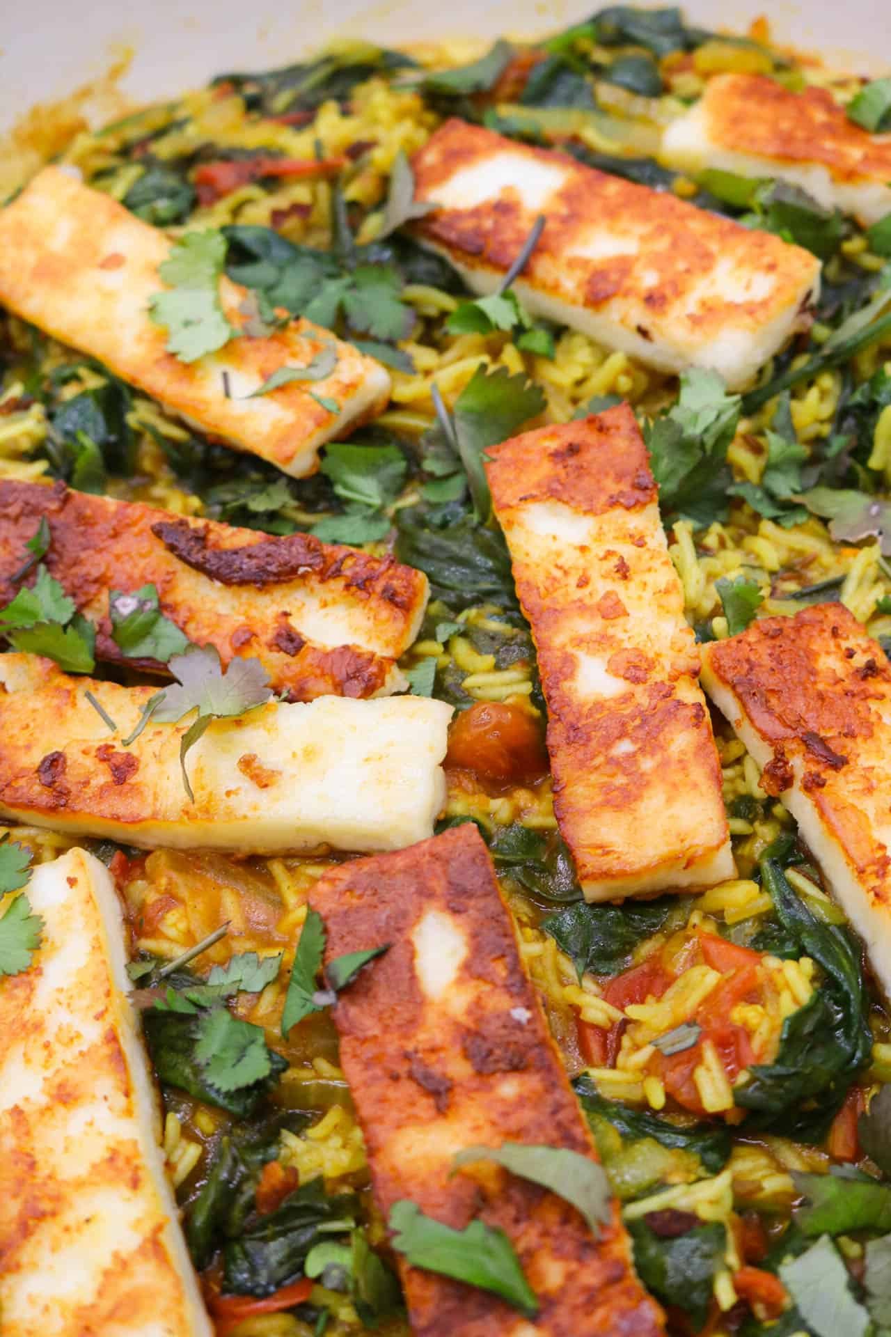Spinach paneer piulaf in large round casserole