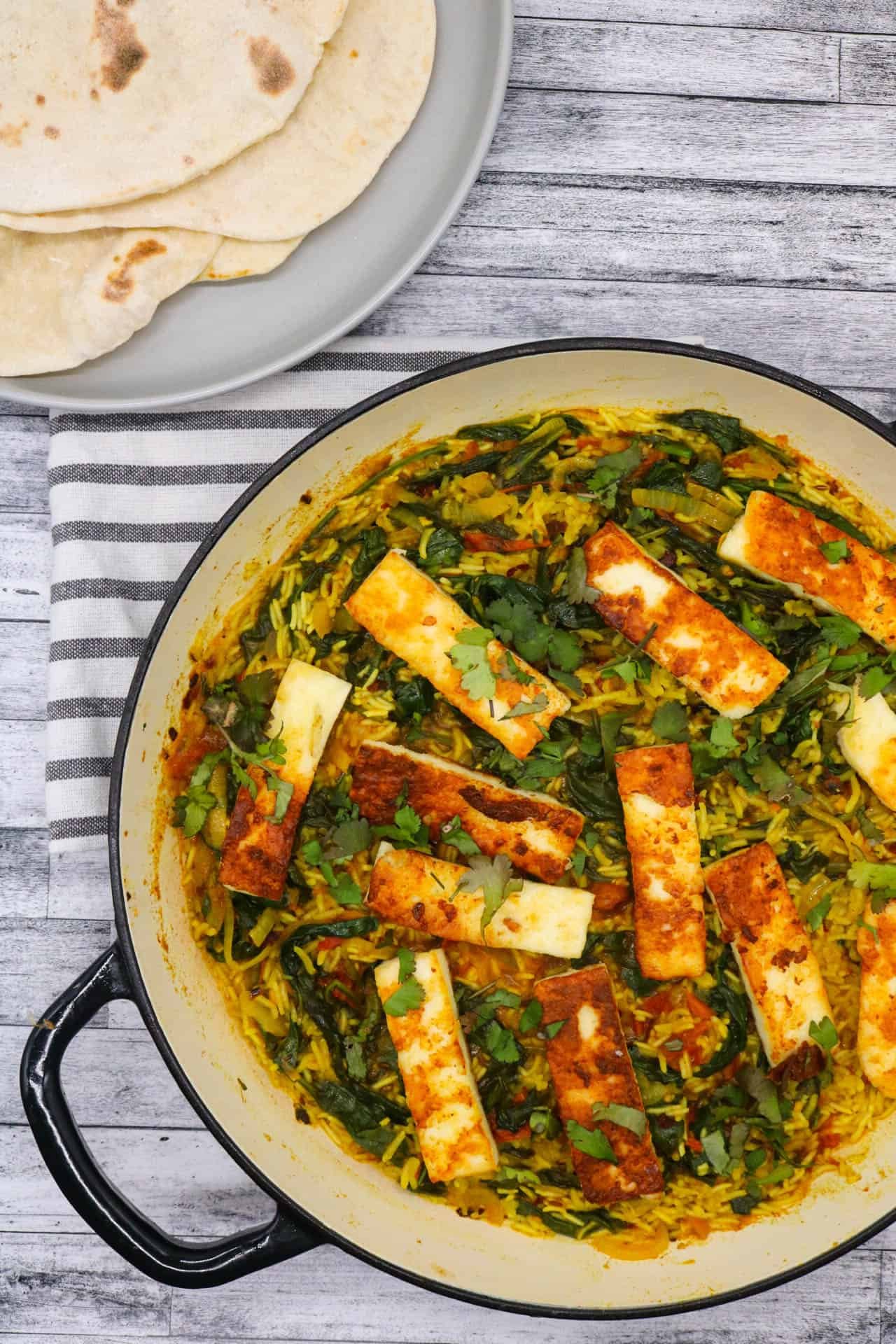 Spinach paneer piulaf in large round casserole