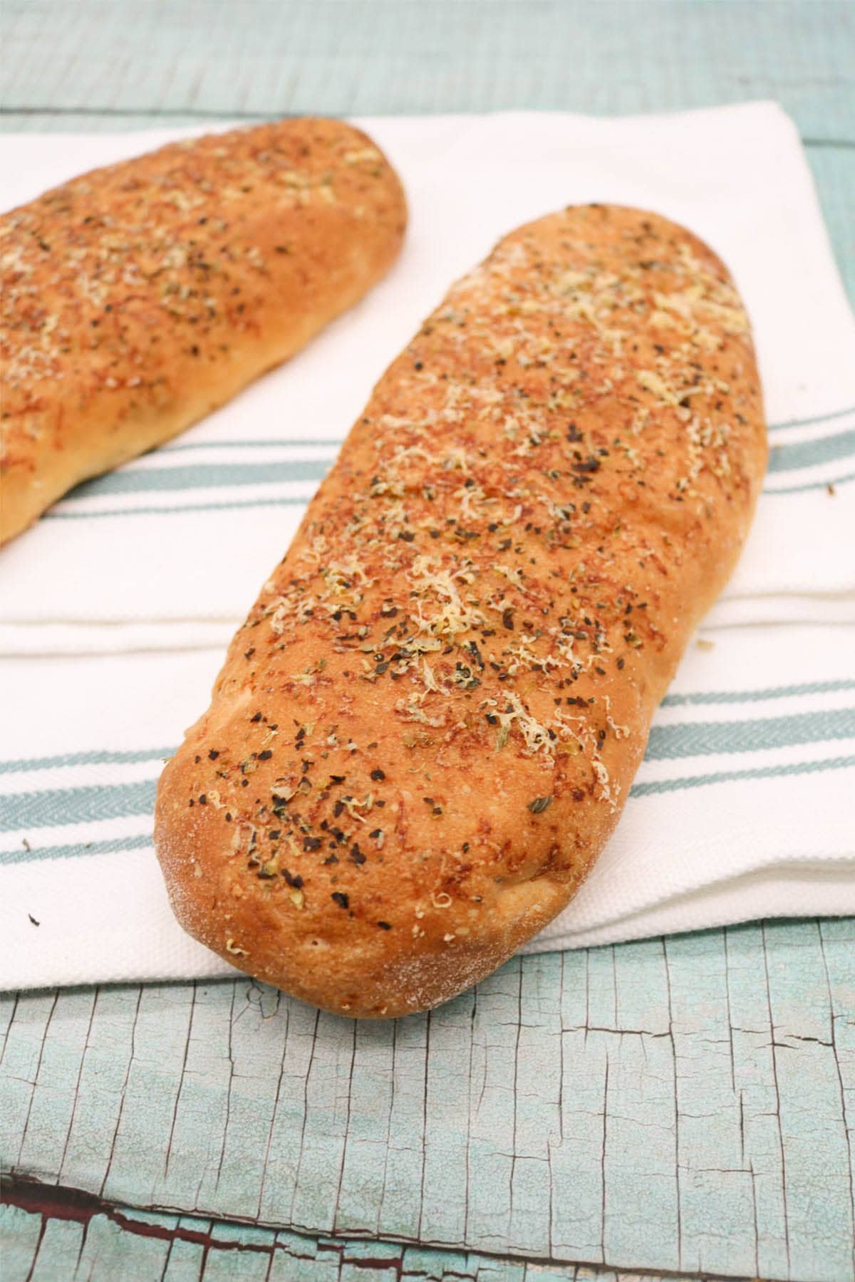Italian herb sub rolls on towel