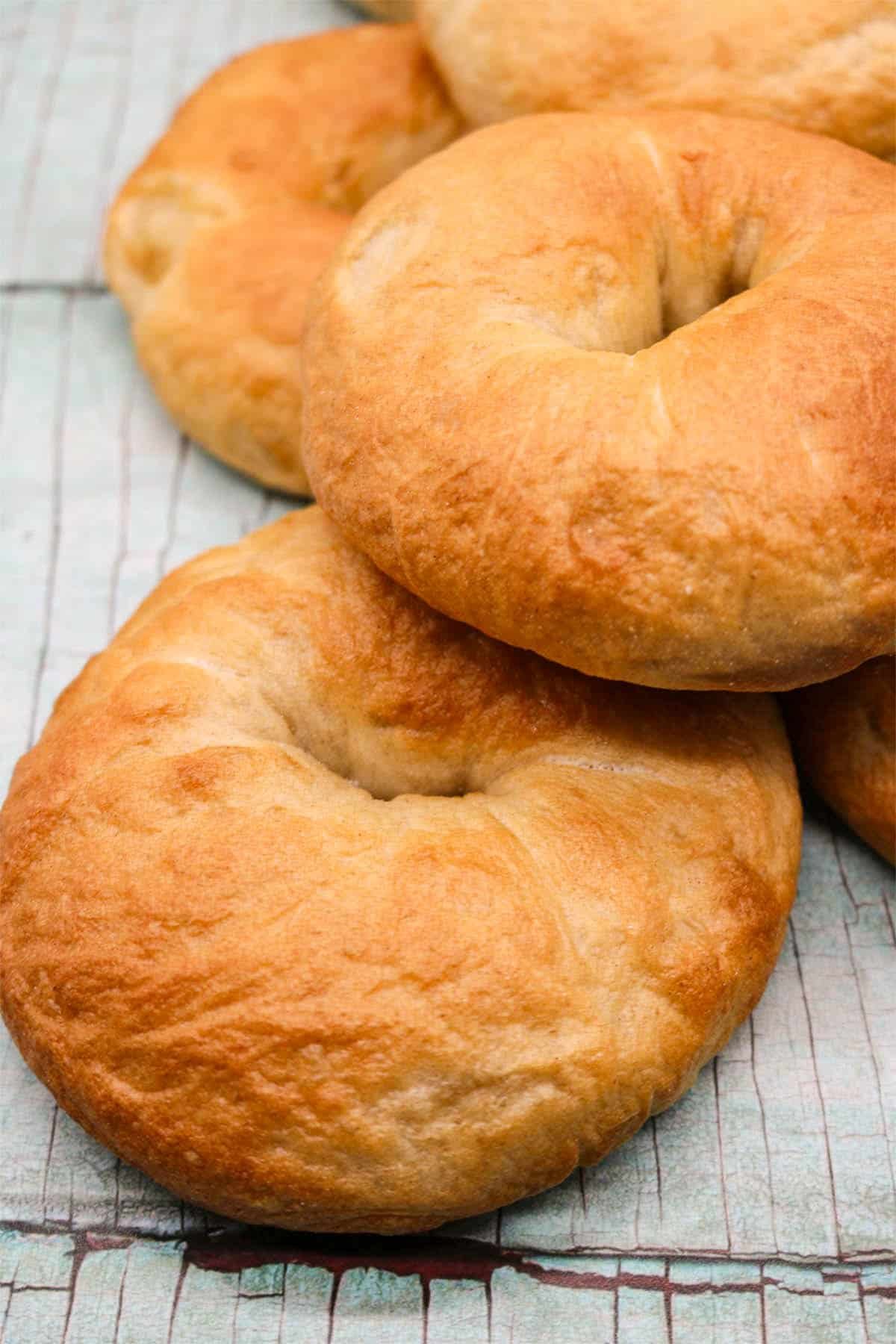 Close up of eight bagels stacked