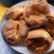 close up of Yorkshire puddings in a white bowl