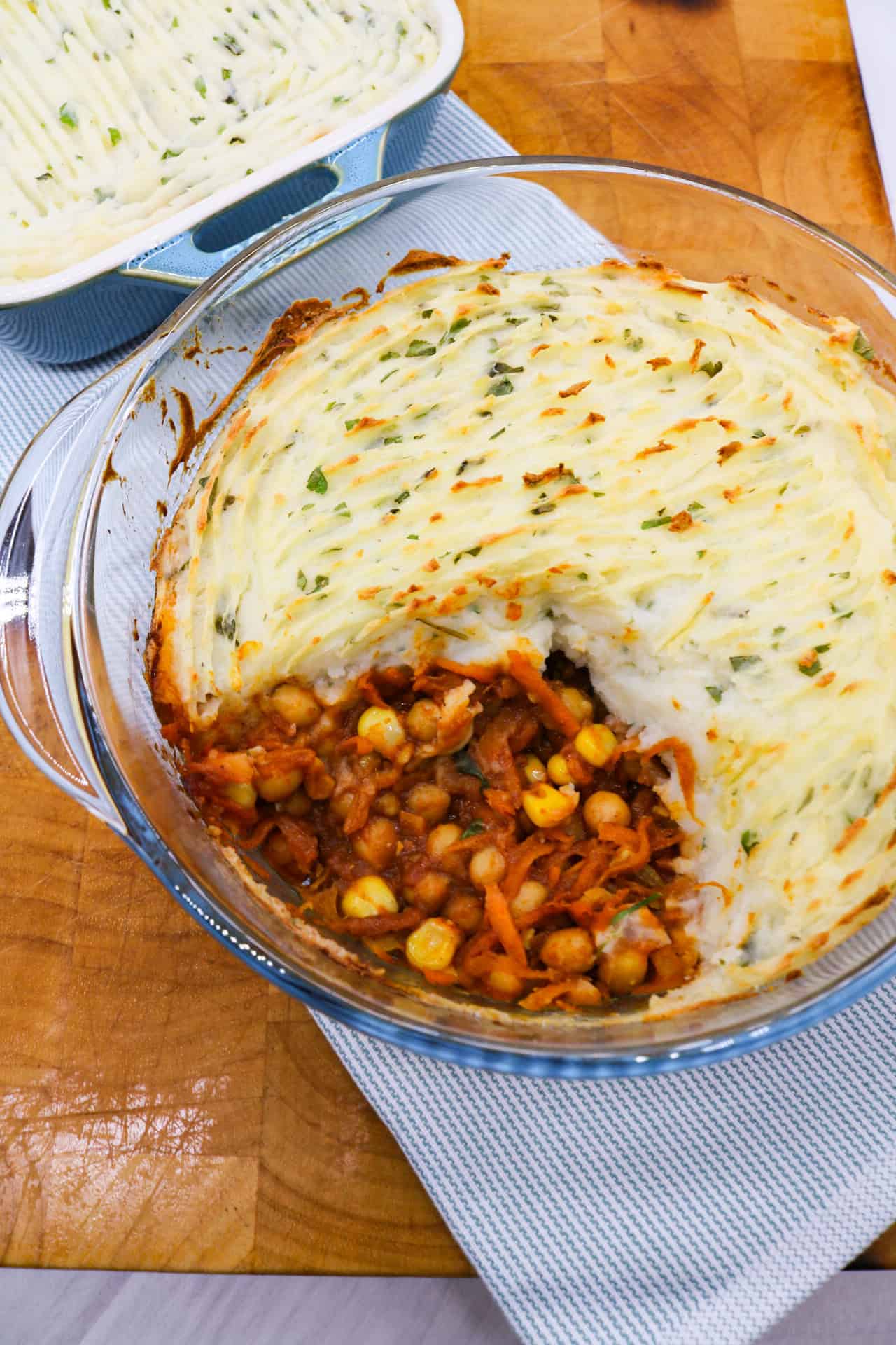 Spicy veggie pie in a clear round oven dish.
