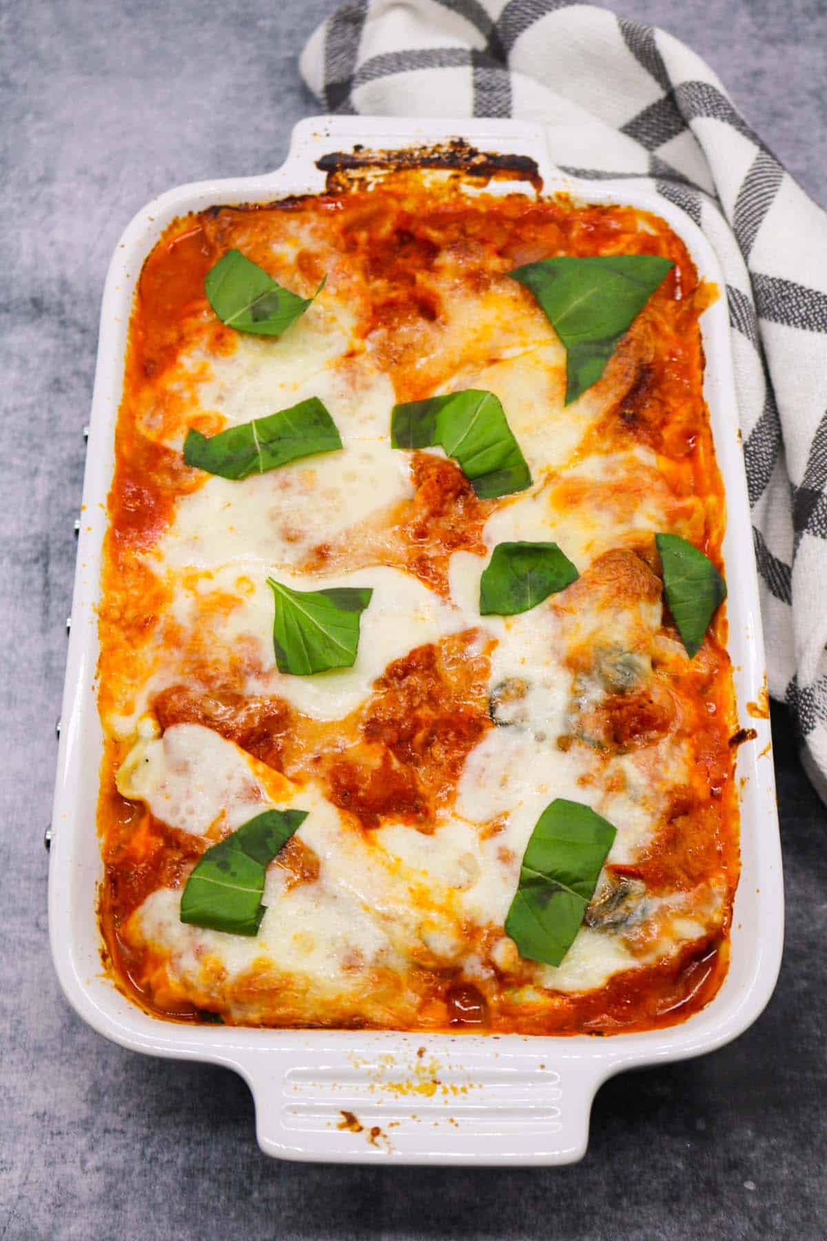 Three cheese conchiglioni in rectangle serving dish
