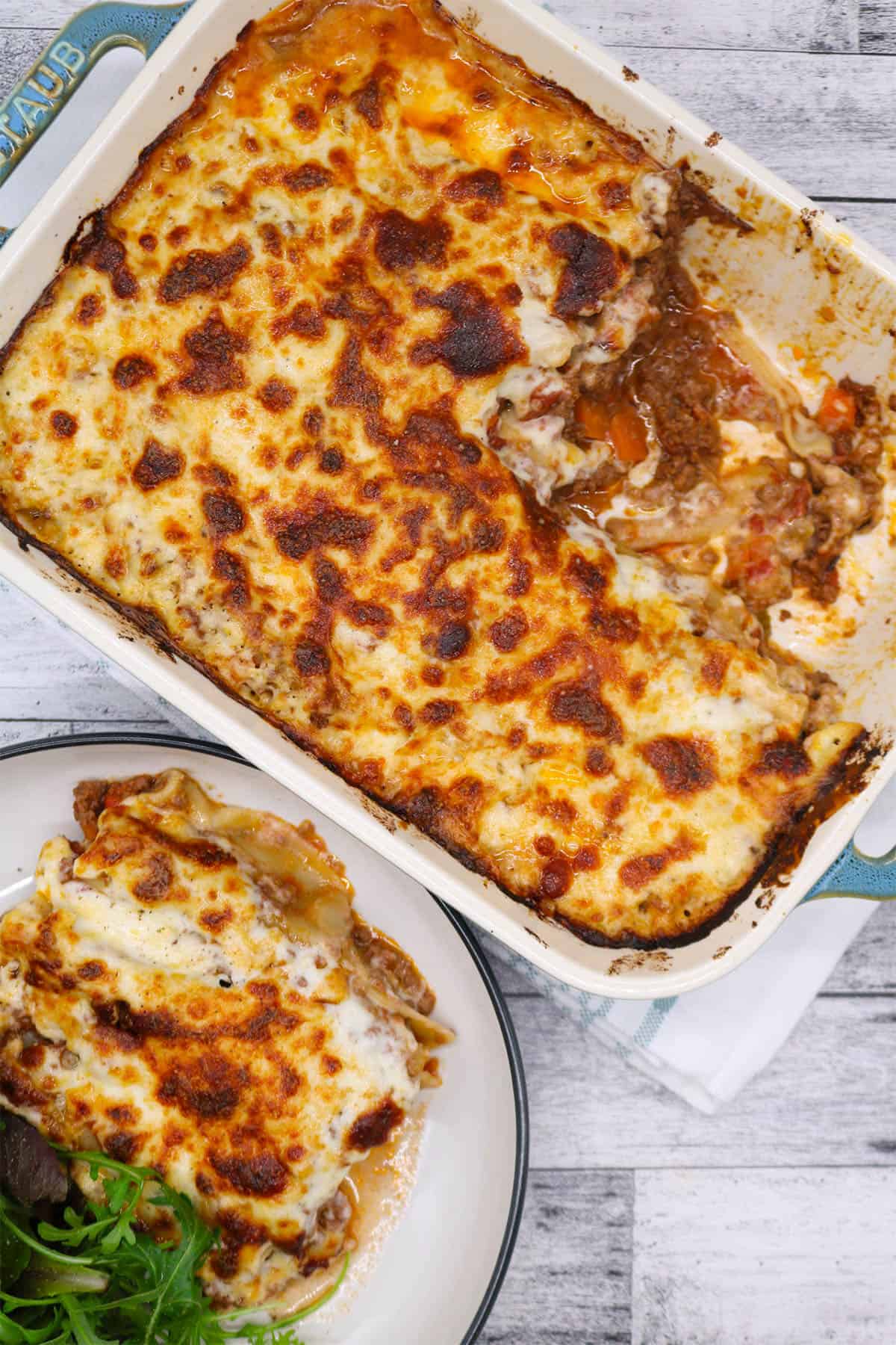Beef cannelloni large rectangle oven dish with portion in bowl