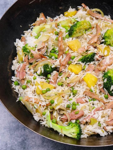 Gammon and pineapple rice in wok