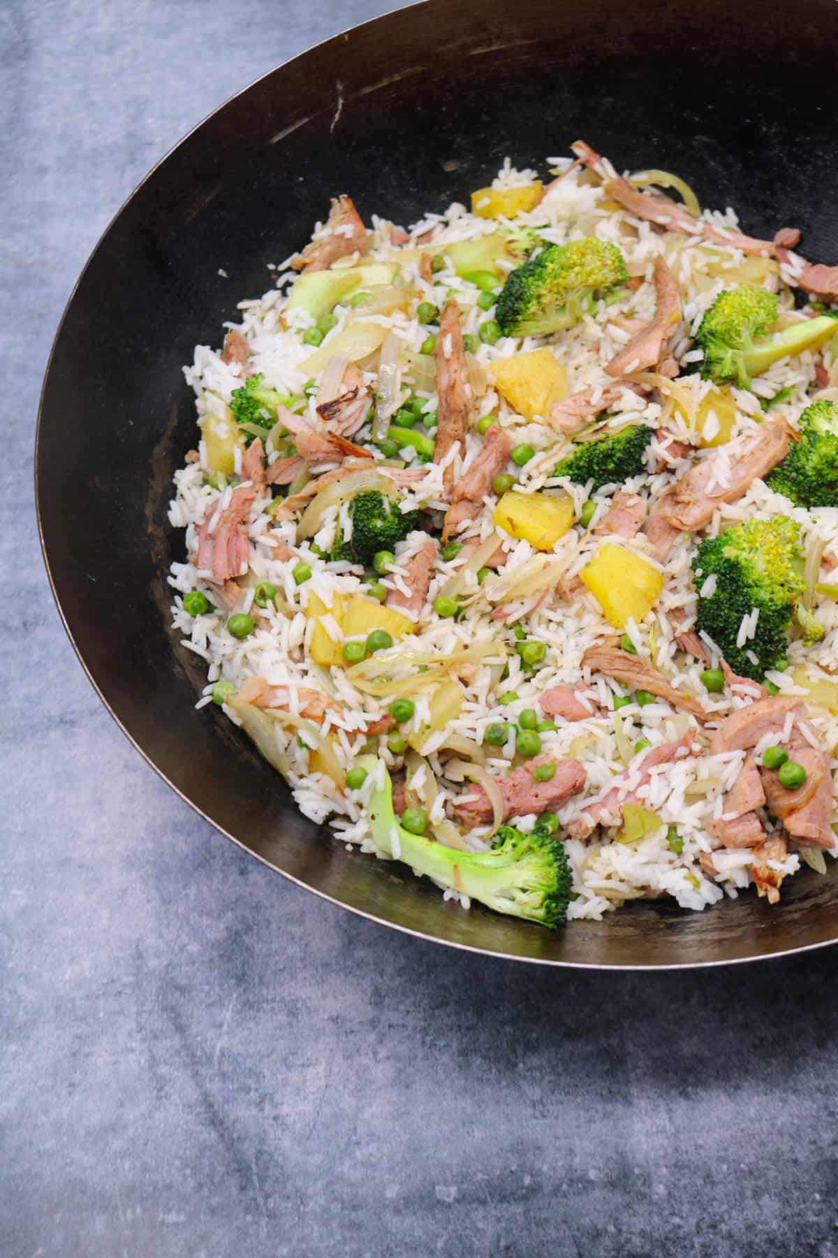 Gammon and pineapple rice in wok