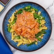 Quick and easy smoked salmon pasta in a blue patterned bowl.