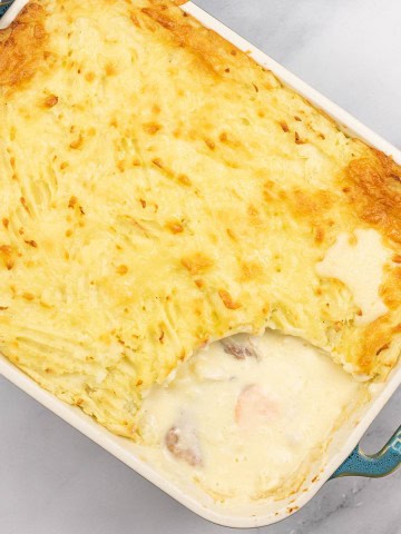Fish pie in a rectangular ovenproof Staub dish.