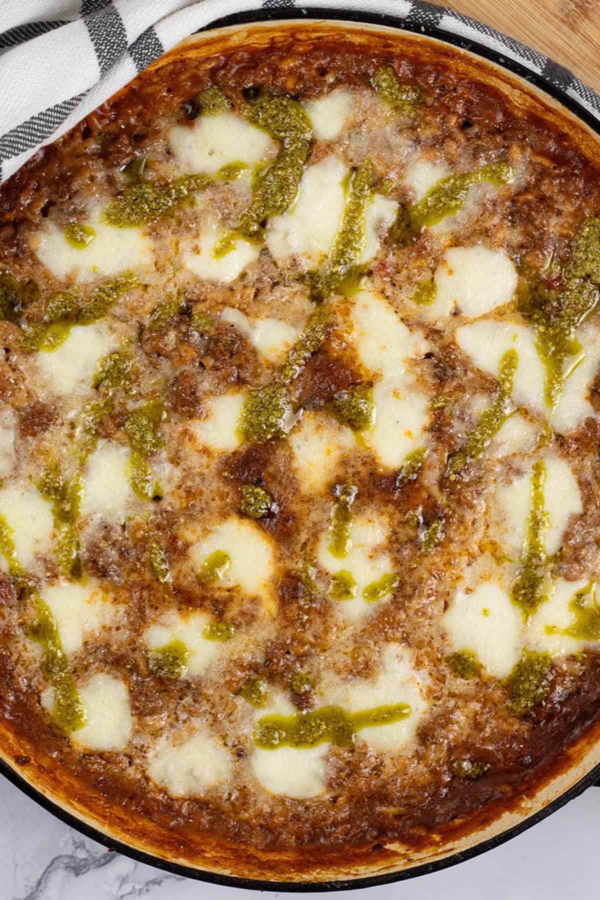 Risotto bolognese in a large shallow round casserole dish.